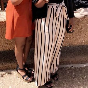 Cream and black striped trouser pants with bow